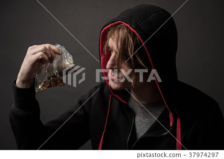 Displeased guy with illegal dope 37974297