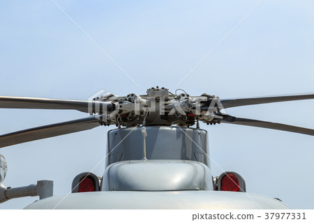 Propeller of grey helicopter of Thai army on blue sky 37977331