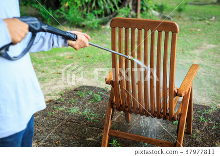 Wooden chair cleaning with high pressure water jet 37977811