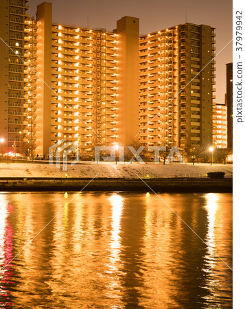 High-rise apartment along the river High-rise apartment along the river 37979942
