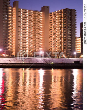 High-rise apartment along the river High-rise apartment along the river 37979943