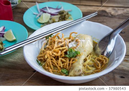 Curried Noodle Soup (Khao soi) with chicken , Curried Noodle Soup (Khao soi) with chicken , 37980543