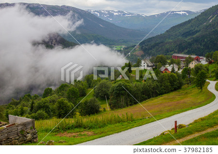 the beautiful view on Naeroydalen valley and peaks the beautiful view on Naeroydalen valley and peaks 37982185