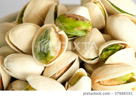 Roasted salted Pistachios are dried nuts close up 37986591