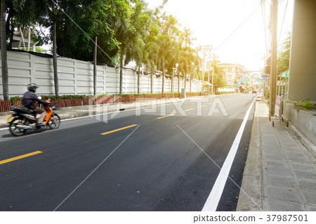 Asphalt road in the alley connected to main road 37987501