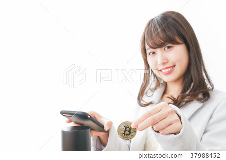 Woman settling in virtual currency Woman settling in virtual currency 37988452