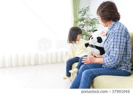 Child playing with grandma Child playing with grandma 37991048