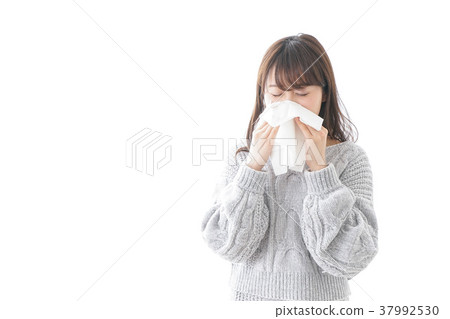 Woman blowing nose nose allergy allergy cold image Woman blowing nose nose allergy allergy cold image 37992530