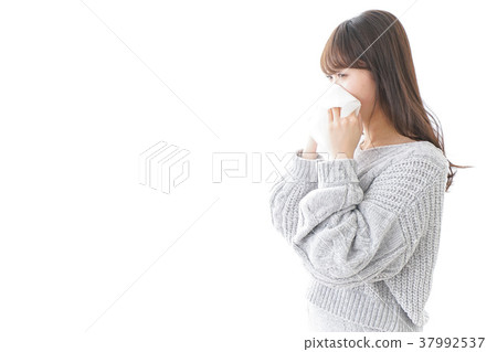 Woman blowing nose nose allergy allergy cold image Woman blowing nose nose allergy allergy cold image 37992537