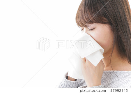 Woman blowing nose nose allergy allergy cold image 37992545