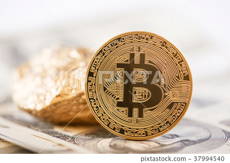 Main cryptocurrency golden bitcoin and gold lump 37994540