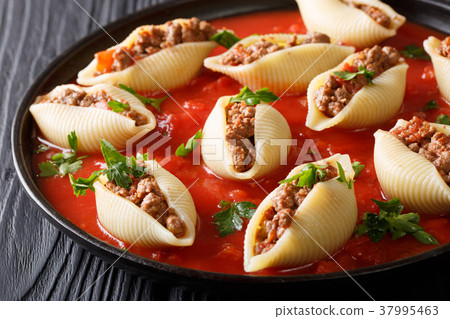 Delicious conchiglioni pasta Delicious conchiglioni pasta 37995463