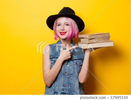 hipster girl with pink hairstyle with books hipster girl with pink hairstyle with books 37995530