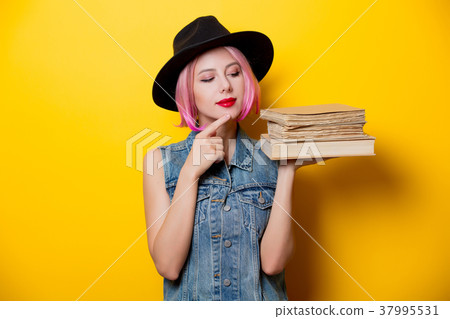 hipster girl with pink hairstyle with books hipster girl with pink hairstyle with books 37995531