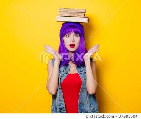 hipster girl with purple hairstyle with books 37995594