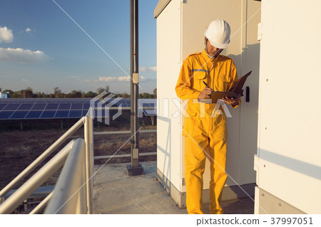 Young engineers are monitoring and recording 37997051