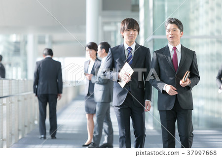Male business image of businessman suits showing conversation Male business image of businessman suits showing conversation 37997668
