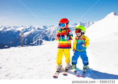 Ski and snow winter fun for kids. Children skiing. 38001532