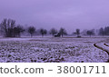 small barn in the field on a rainy day 38001711