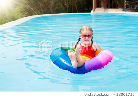 Child in swimming pool. Kids swim. Water play. Child in swimming pool. Kids swim. Water play. 38001735