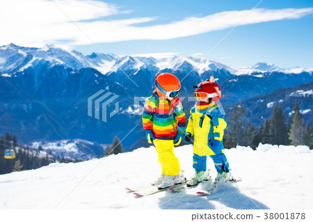 Ski and snow winter fun for kids. Children skiing. Ski and snow winter fun for kids. Children skiing. 38001878