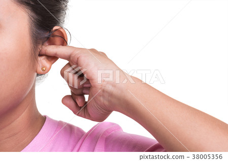 Close up woman trying cleaning her ear by using her finger isolated on white Close up woman trying cleaning her ear by using her finger isolated on white 38005356