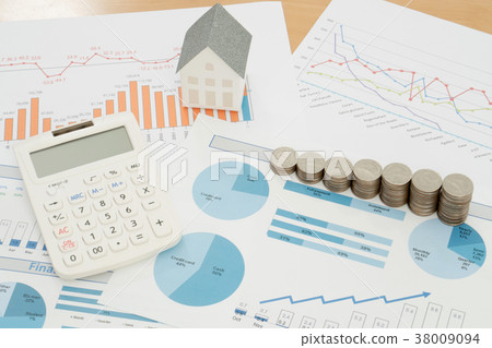With House Model And Stack Of Coins On Desk With House Model And Stack Of Coins On Desk 38009094