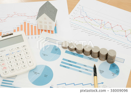 With House Model And Stack Of Coins On Desk With House Model And Stack Of Coins On Desk 38009096