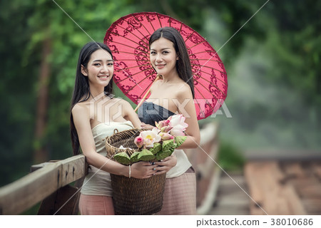 Fashion portrait of young beautiful girl in forest, Women with p 38010686