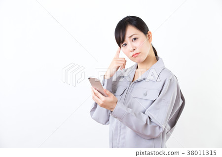 Business woman (work clothes, smartphone) Business woman (work clothes, smartphone) 38011315