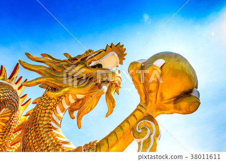 Statue of gold dragon in Asian temple, blessing 38011611