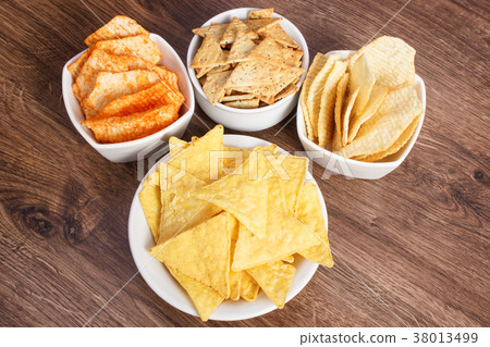 Salted crisps and cookies, unhealthy food Salted crisps and cookies, unhealthy food 38013499