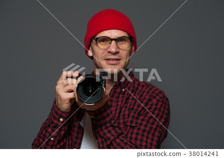 Positive male photographer with camera Positive male photographer with camera 38014241