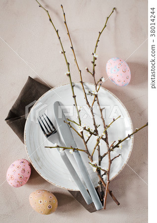 Easter table setting with spring branches 38014244