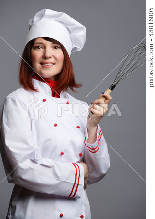 Photo of woman chef in white robe and cap with 38016005