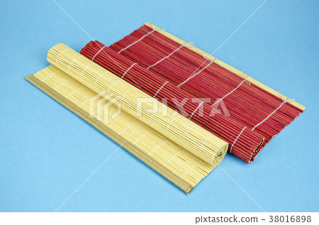 two bamboo table napkin on blue background two bamboo table napkin on blue background 38016898