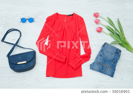 Fashion concept. Red blouse, jeans, handbag Fashion concept. Red blouse, jeans, handbag 38016901