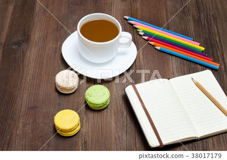 Coffee mug, macaroons, colored pencils 38017179