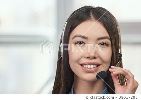 Portrait of adorable asian girl wearing headphone. Portrait of adorable asian girl wearing headphone. 38017293