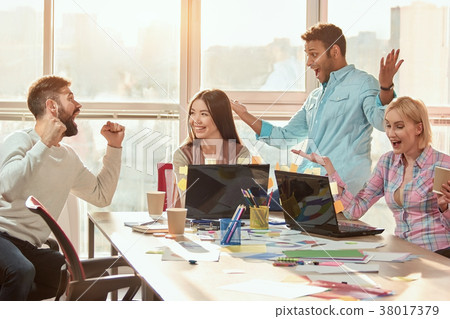 Business people colleauges rejoicing success. 38017379