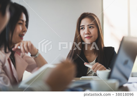 Two women participate business meeting 38018096