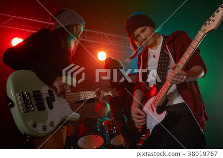 Teenagers are playing rock. Teenagers are playing rock. 38019767