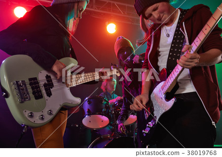 Teenagers are playing rock. 38019768