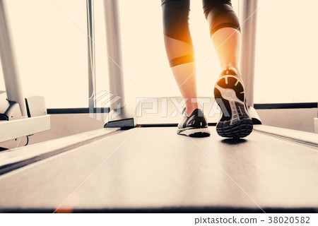 Lower body at legs part of Fitness girl running 38020582