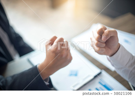 two business man use hand to fist bump two business man use hand to fist bump 38021106