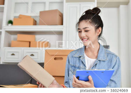 Sme business concept. Young Asian people are packing their packa 38024069
