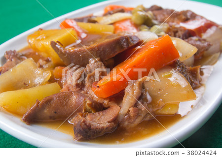Pork tongue stew on the plate 38024424