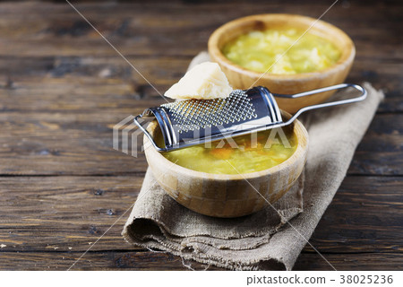 Vegetable vegetarian soup with parmesan cheese 38025236