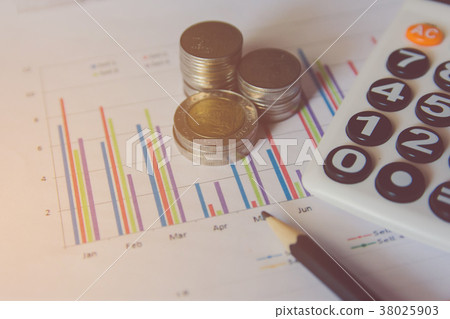 coins stack, calculator, Pencil on Financial data coins stack, calculator, Pencil on Financial data 38025903