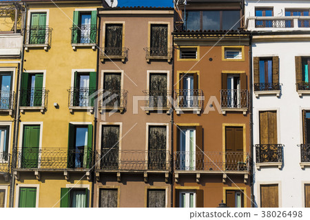 Facades of apartment buildings in Padua, Italy.  38026498